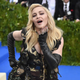 Illustration for article titled Madonna Has John Lennons Imagine Lyrics Hanging Over Her Toilet